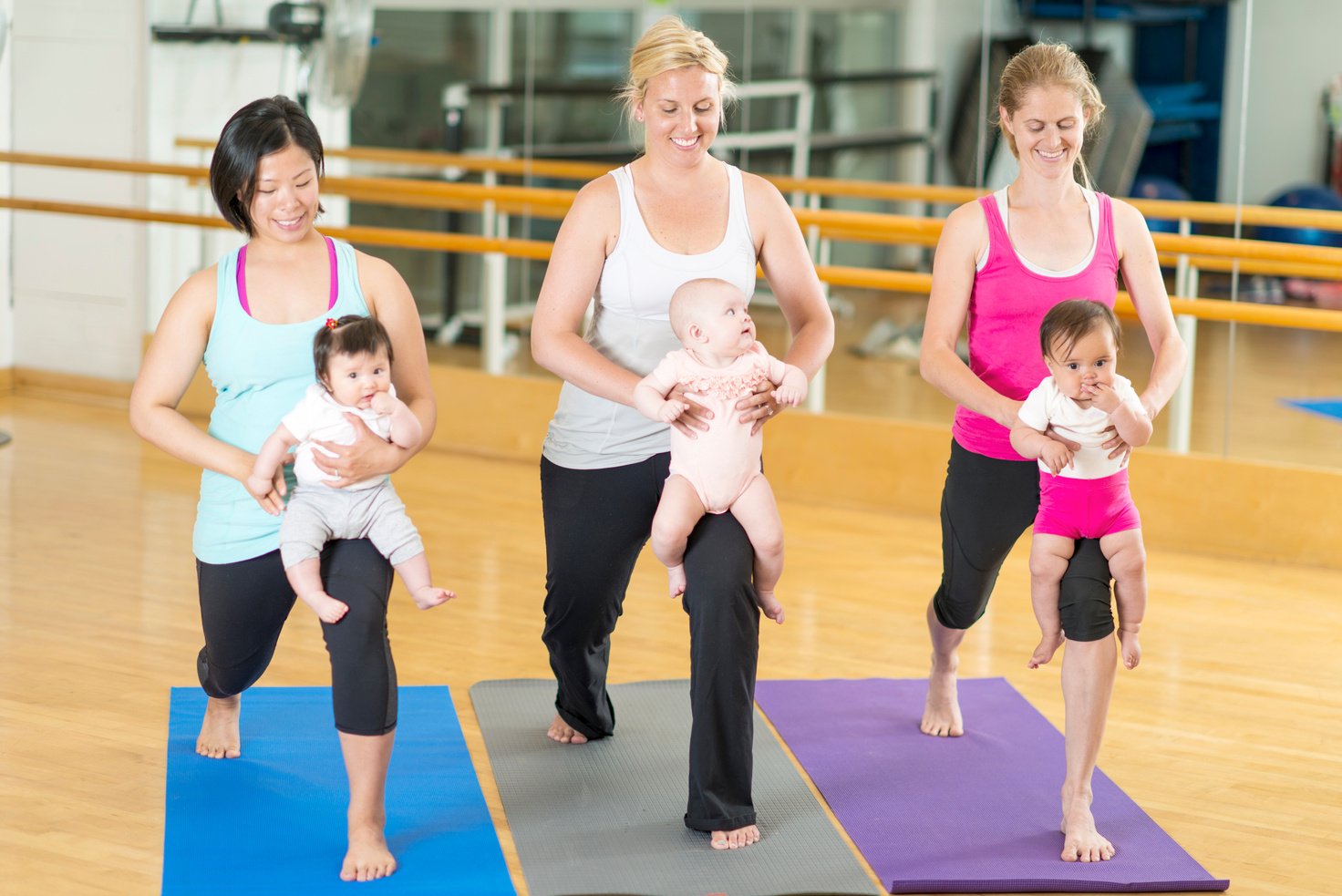 Babies and moms exercising